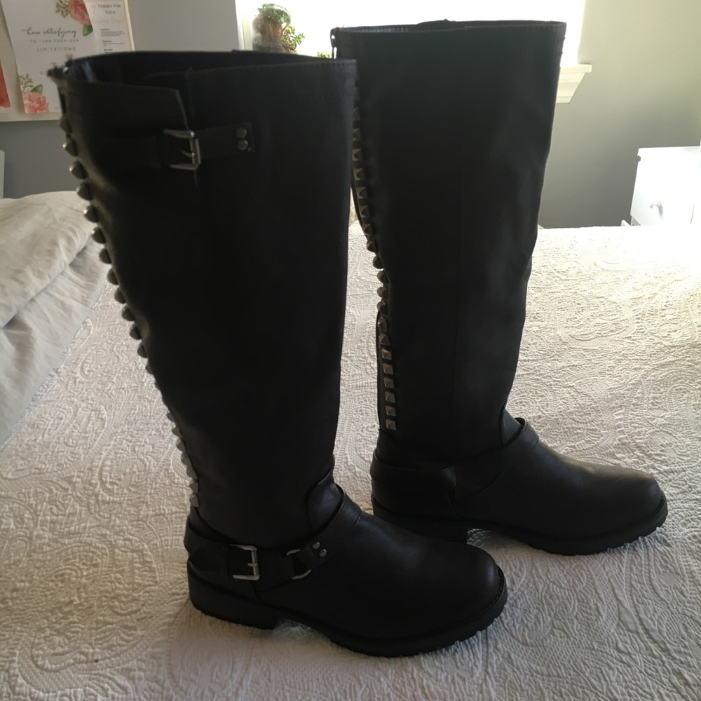 Tall Brown leather boots.